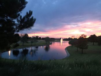 Scenic view of lake against sky during sunset