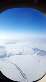 Aerial view of snow covered landscape