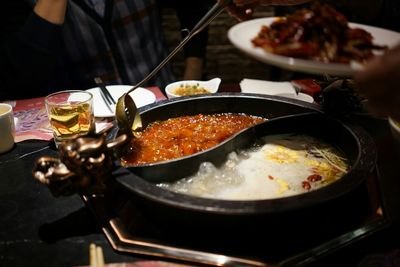 Close-up of fresh shabu-shabu served on table at restaurant