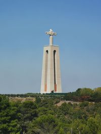 Low angle view of statue against sky