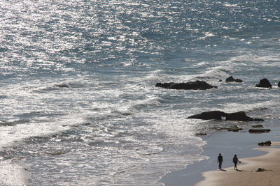 Close-up of man swimming in sea