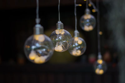 Close-up of illuminated light bulbs