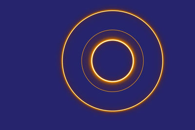 Directly below shot of illuminated light against black background