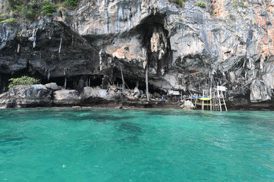 People kayaking in sea