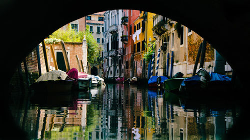 View of buildings seen through arch window