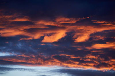 Low angle view of dramatic sky during sunset