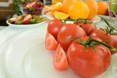 Close-up of fruits in plate on table