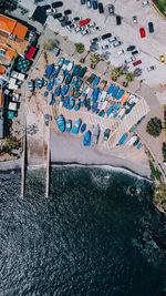 High angle view of chairs on beach