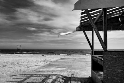 Pier over sea against sky
