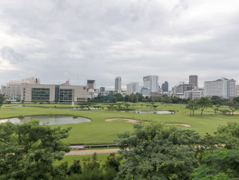 Buildings in city against sky