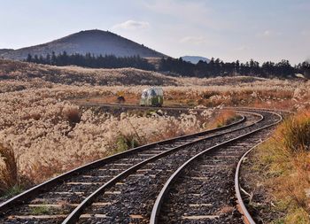 Railroad tracks against sky