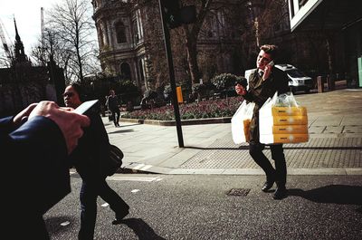 People in front of building