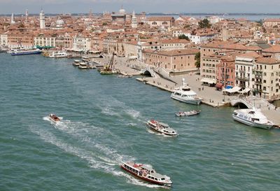 Venetian vaporetti speed local commuters and tourists across the venice basin