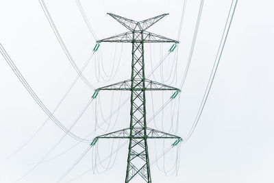 Extra-high voltage 400 kv overhead power line on large pylon used for long distance energy transfer