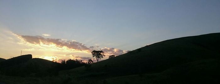 Scenic view of mountains at sunset