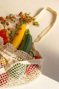 High angle view of vegetables on table against wall