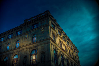 Low angle view of building against sky at night