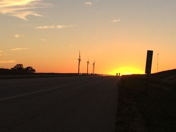View of country road at sunset