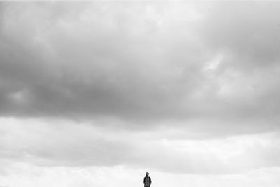 Low angle view of person against sky