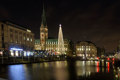 Buildings in city at night