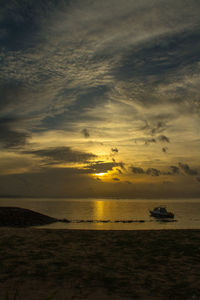 Scenic view of sea at sunset