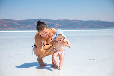 Mother and son at beach