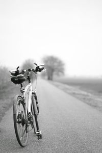 Motorcycle on road against sky