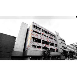 Low angle view of modern building against sky