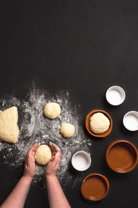 High angle view of person preparing food on table