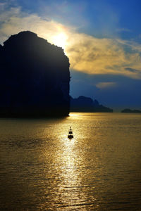 Scenic view of calm sea at sunset