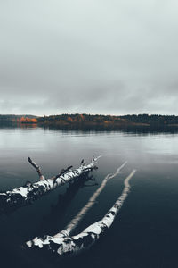 Scenic view of frozen lake against sky