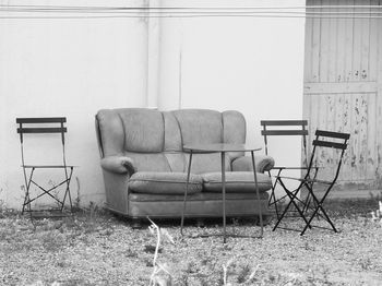 Empty chair in abandoned building