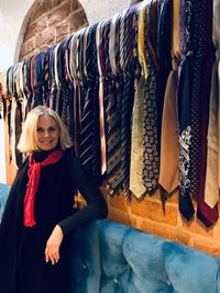 Portrait of smiling young woman standing in store