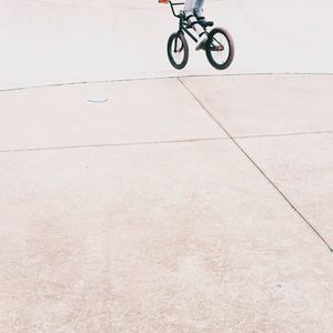 Rear low section of bicycling on the road