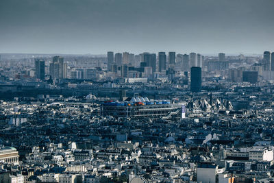 High angle view of buildings against sky in city