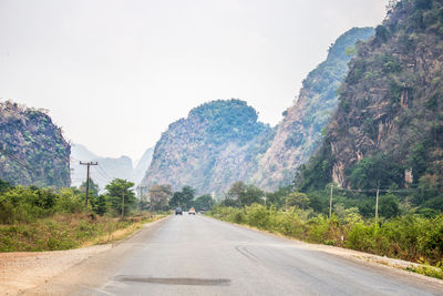 Road leading towards mountains