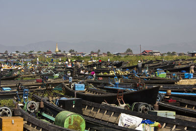 High angle view of boats moored at harbor