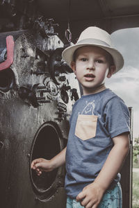 Portrait of cute boy wearing hat