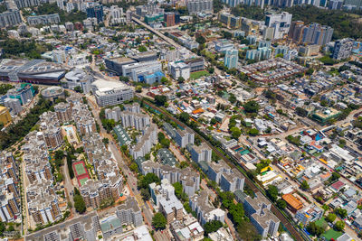 High angle view of street amidst buildings in city