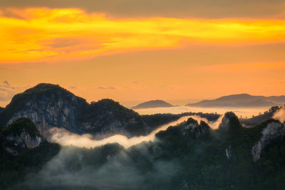 Scenic view of dramatic sky during sunset