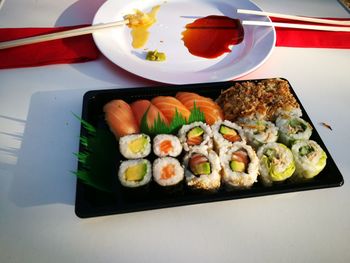 High angle view of sushi served on table