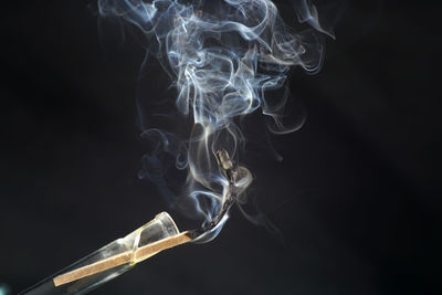 Close-up of smoke against black background