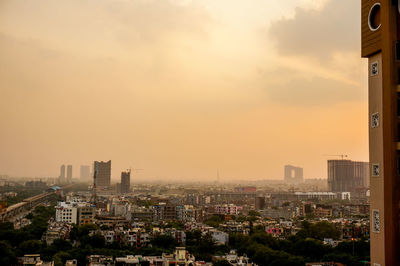 High angle view of cityscape at sunset