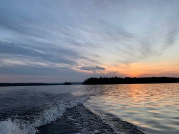 Scenic view of sea against sky during sunset