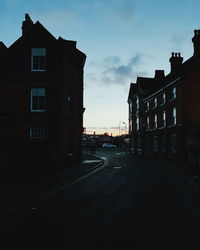 Road in city against sky