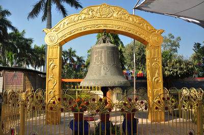 View of temple against building