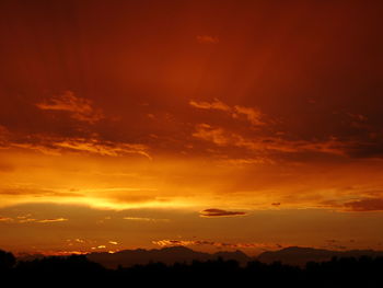 Scenic view of dramatic sky during sunset