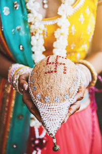 Close-up of woman holding ice cream