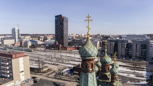 High angle view of buildings against sky in city