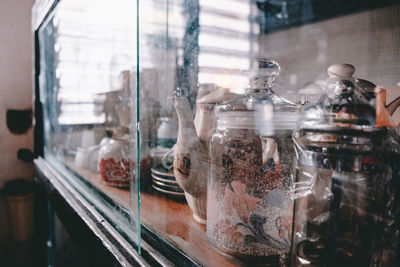 Close-up of glass jar on table